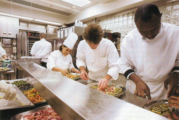 Chefs in a kitchen prepping